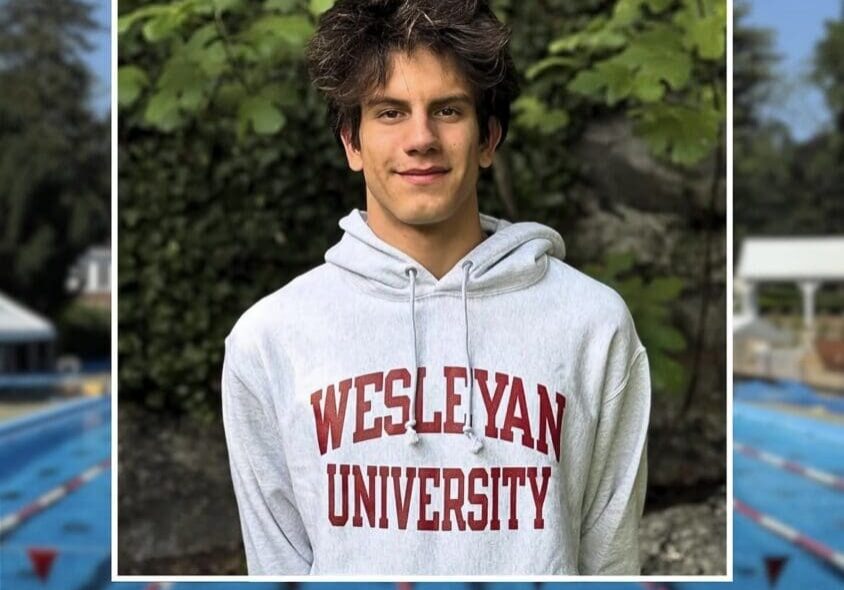 Young man in Wesleyan University hoodie.