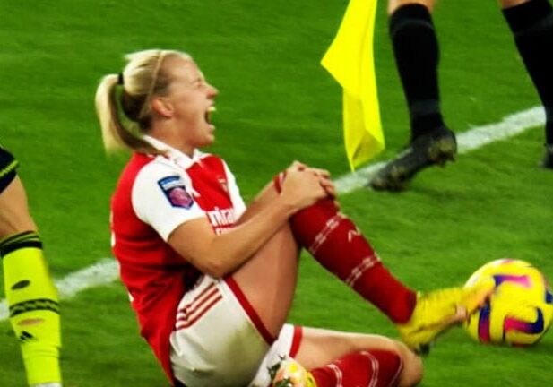 Soccer player injured on the field.